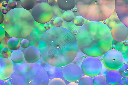 混合水和石油 美丽颜色抽象背景的美色宏观气泡液体背景图片
