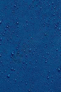 经典蓝色防水疏水平布特写带雨滴背景图片