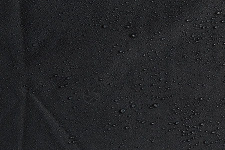 深灰色防水疏水平布特写带雨滴背景纳米绝缘材料雨衣纺织品织物墙纸下雨季节水滴图片