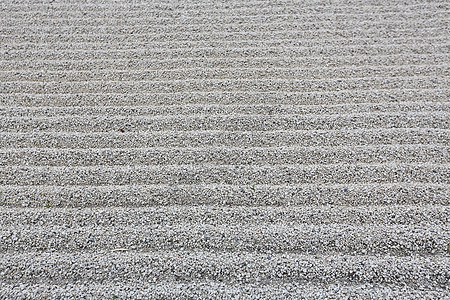 日本禅宗花园 沙中有石头 京都 Japa平衡倾斜卵石艺术岩石冥想精神健康圆圈温泉图片