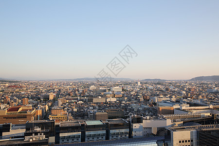 京都 日出时的日本城市风景公共汽车办公室游客旅行建筑学场景仓库地标吸引力商业图片