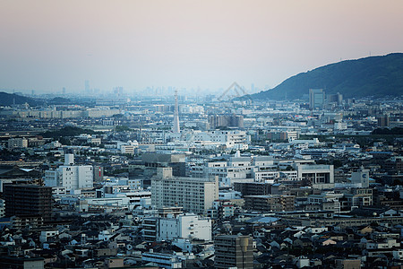 京都 日出时的日本城市风景景观公共汽车城市市中心游客车站办公室建筑物旅行天际背景