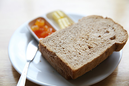 橙果酱切片面包礼仪粮食食物白色谷物小麦种子饮食营养棕色图片