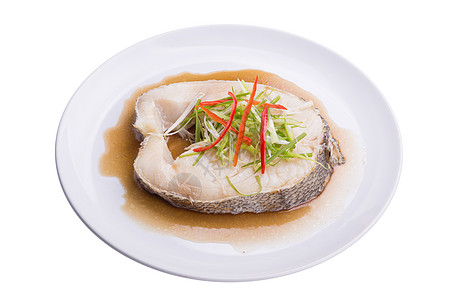 雪鱼在白盘中用酱油蒸出鳕鱼烹饪大豆海鲜饮食美食煤炭午餐白色盘子图片