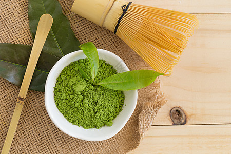 一套火柴粉碗 木勺和胡须 绿茶叶叶子粉末仪式饮料草本植物食物绿色抹茶黑色美食图片