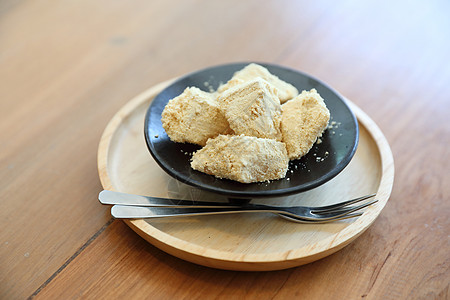 木制桌上的日式甜点早餐饺子粉末果子旅行小吃桌子糖果食物大豆图片