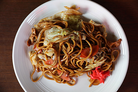 Yakisoba 炸面日本风格蔬菜午餐食物菜单餐厅面条厨房猪肉筷子油炸图片