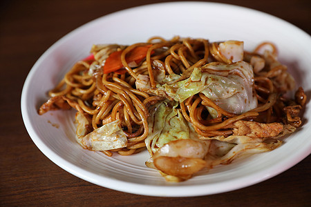 Yakisoba 炸面日本风格午餐餐厅菜单油炸蔬菜食物筷子盘子美食面条图片