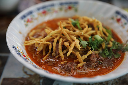 北泰国咖喱面条汤 当地茶叶薯条盘子食谱文化面条洋葱食品食物柠檬午餐牛肉背景图片