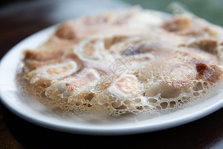 日本菜 盘子上的青藏水饺油炸服务猪肉大豆平底锅美食蔬菜食物小吃图片