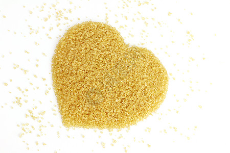 糖的心形 从甘蔗顶部看 背景颗粒糖黄褐色 苏克罗斯糖 红糖甜点咖啡营养食物宏观水晶蔗糖立方体粮食种子图片
