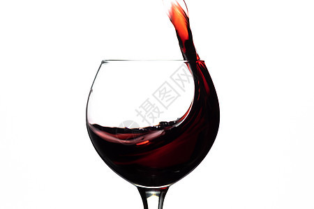 红酒溅入白色背景的玻璃杯中庆典酒杯酒厂高脚杯运动生活瓶子水晶漩涡飞溅图片
