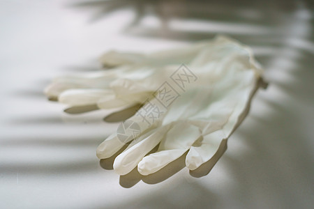 一对白乳胶的医用手套橡皮塑料医院实验室医生安全卫生工作预防保健图片