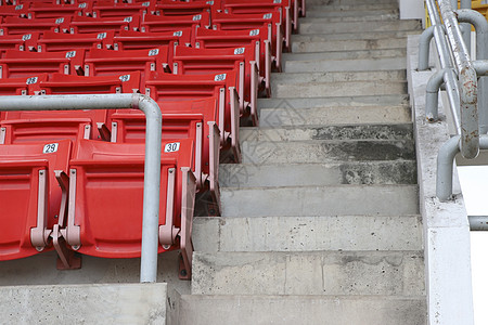 一张看两栖剧院体育表演的椅子 在展台排了位子体育场竞技场手表运动大厅红色游戏座位竞技看台图片