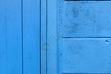 特写有混凝土墙的木蓝色门图片