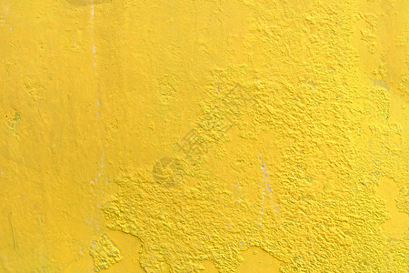 旧黄漆混凝土墙背景背景图片