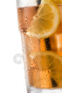 一杯加柠檬的冰茶薄荷水果茶点白色棕色稻草绿色液体黄色玻璃图片
