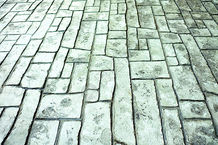 石头路面背景鹅卵石石板材料建造城市小路地面铺路积木花岗岩图片