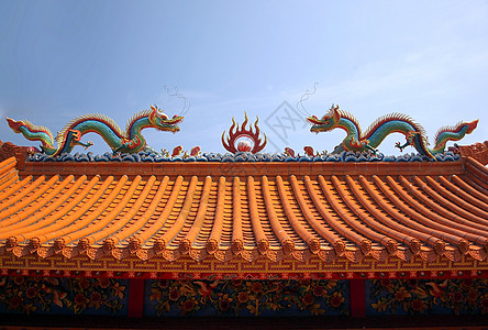 装饰的中华圣殿屋顶橙子遗产天空宗教工艺陶瓷艺术陶器传统瓷砖图片