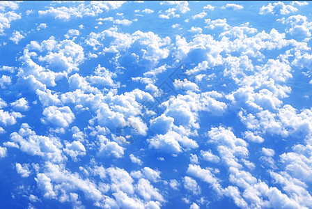 云层之上蓝色航班机器活力旅行引擎涡轮阳光奢华机身图片
