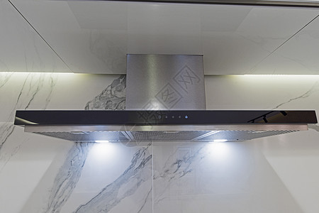 现代厨房烹饪器在豪华公寓内器具设计烟囱排气扇窗户瓷砖墙灰色奢华风格棕色背景图片