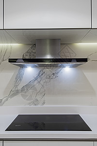 现代厨房烹饪器在豪华公寓内设计器具抽油烟机展示装饰奢华电磁炉灰色烟囱风格图片