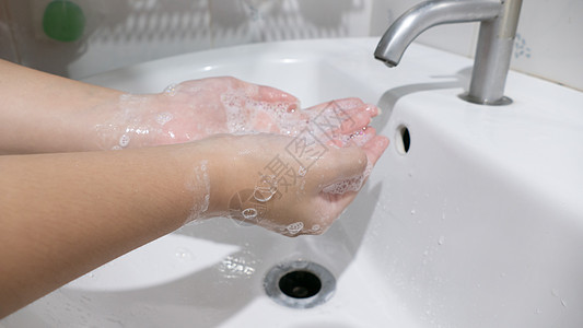缝合女人洗手图片