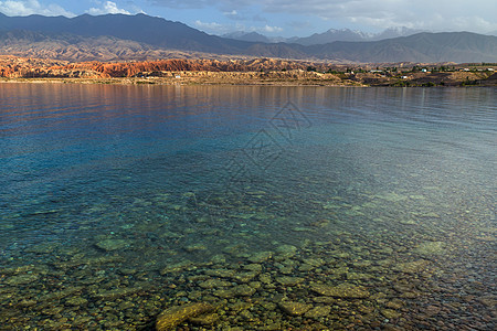 吉尔吉斯斯坦IssykKul湖场景天空海滩旅游蓝色全景海岸旅行国家支撑图片