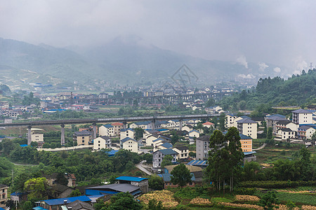 从中国重庆的武隆 美丽的乡村一面洞穴地标摩天大楼店铺景观文化吸引力街道历史市中心图片