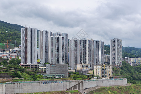 从中国重庆的武隆 美丽的乡村一面建筑学地标洞穴摩天大楼景观商业游客城市店铺建筑图片