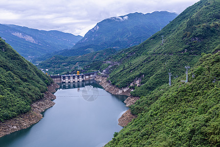 中国重庆武隆大坝的水坝墙和周围风景 夏季水位低 阳光明媚 天气晴朗水电洪水建筑天空水库力量技术文化旅行瀑布图片