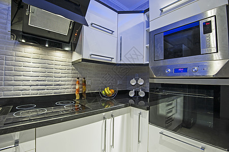 豪华公寓厨房面积橙子装饰炉灶展示台面柜台窗户果盘房子微波图片