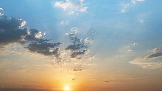 蓝色和橙色日落天空 阳光照耀风暴辉光天气射线旅行日落天空橙子环境晴天图片