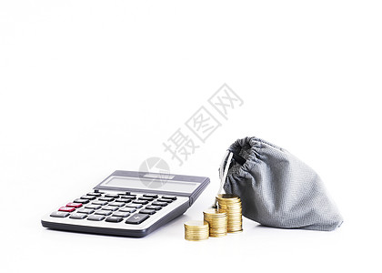 计算器和装有货币袋的硬币用于贷款概念图片