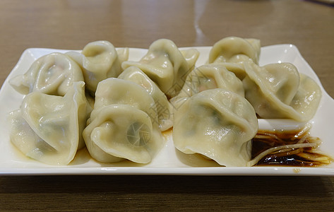 中国蔬菜大杂人水饺盘子食物酱油美食服务面团图片