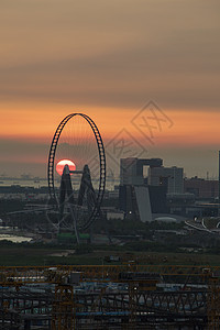 这是日落时的中华天线 反射建筑建筑学景观太阳天空城市日出起重机天际图片