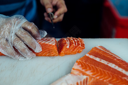 亚洲厨师切片 日食 生鱼肉木头盘子美食厨房橙子自助餐海鲜武士餐厅饮食图片