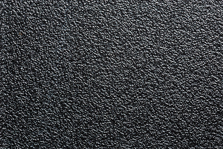 平坦的黑色坚固塑料或橡胶表面 带有装饰性凹凸不平的饰面图片