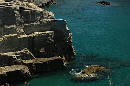 Ischia地中海的火山岩和岩石 Clau地标海岸线蓝色海湾坐骨海岸悬崖火山地质学图片