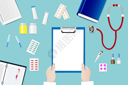 医生手拿着空白纸的医疗桌技术笔记本药品桌面工具办公室配件药片笔记保健图片