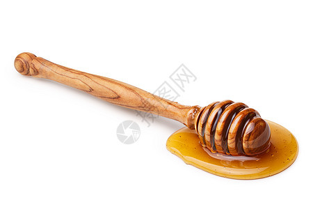木制蜂蜜宏观棍棒白色背景图片