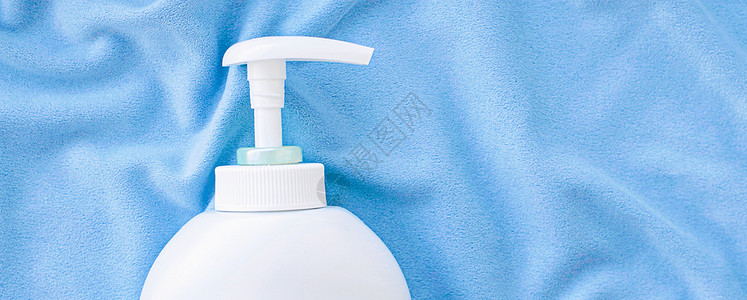 蓝丝 卫生用品和保健品上抗菌液体肥皂和洗手液模型的空白标签瓶化妆品小样身体洗发水管子瓶子保湿洗剂平铺织物图片