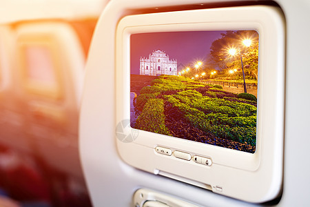 圣保罗村一楼客座乘客座位的飞机监视器飞行电视液体水晶按钮皮革屏幕椅子娱乐商业图片