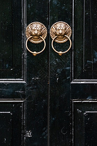 黑斗上的狮子中国门环寺庙文化金子建筑学古董建筑入口安全房子戒指图片
