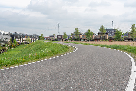 杜丘乡村的空弯曲道路行动运动路线场景国家曲线自由草地风景土地图片