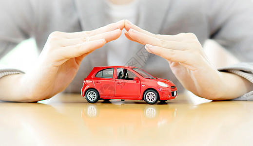 商业女商务人士手和汽车作为保护汽车概念女性车辆玩具危险关怀安全商务维修女士桌子图片