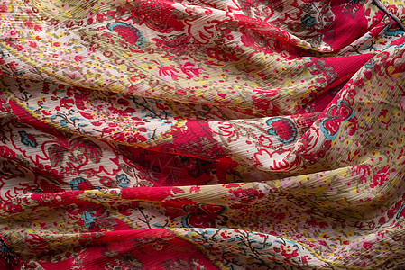 丰富多彩的合成织物纹理敷料古董方巾材料装饰品围巾衣服黄色帆布红色图片