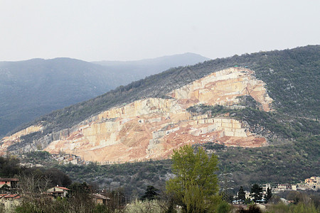 大理石采石场顶峰地球矿业地质学爬坡编队矿物机械天空岩石图片
