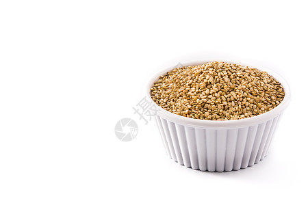 白弓的金叶子碎粒亚麻谷物种子食物粮食小麦棕色白色背景图片
