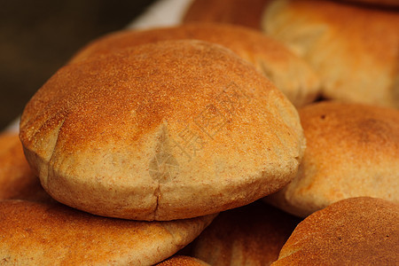 扁面包小麦食物面粉圆形白色市场美食棕色图片